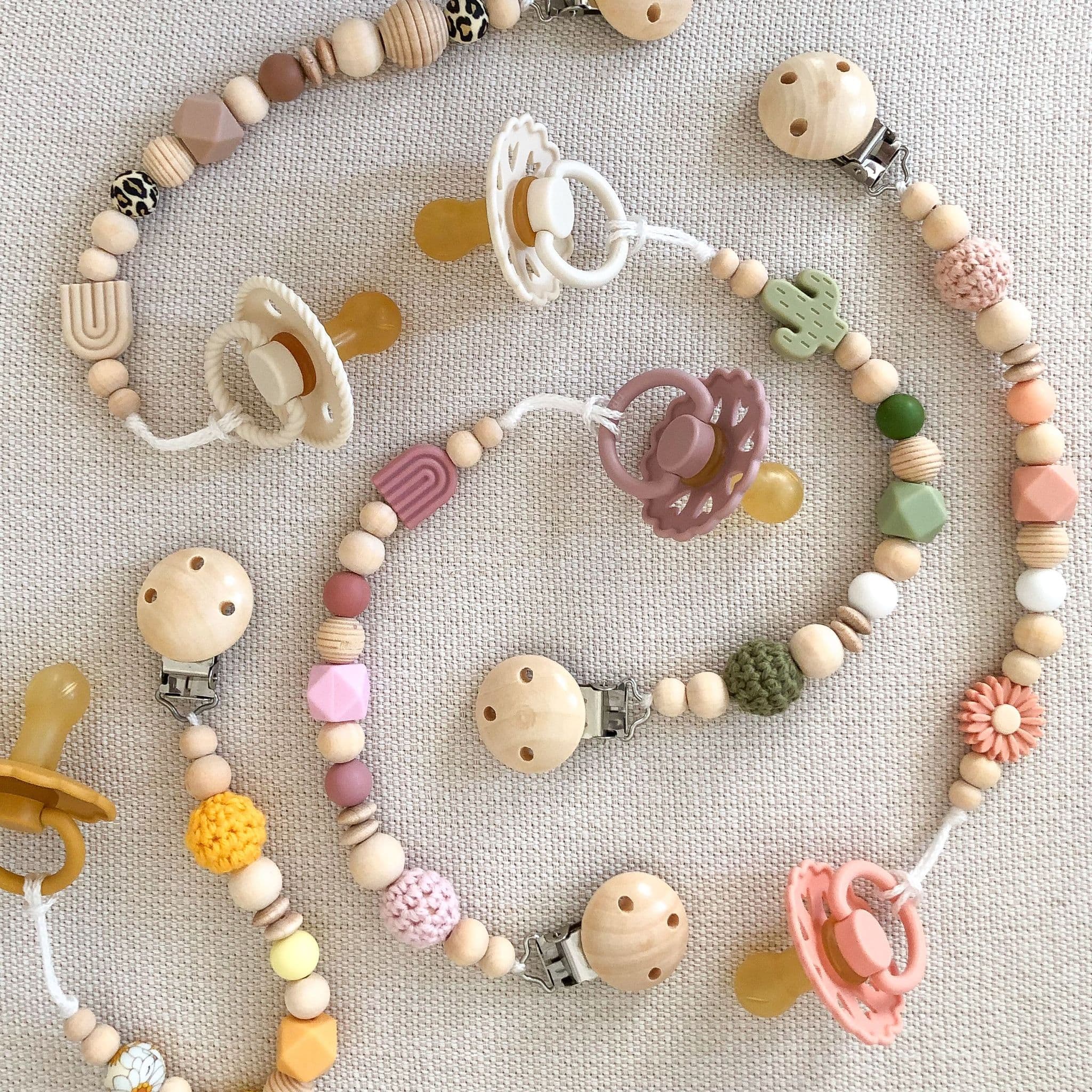Colorful pacifier clips background